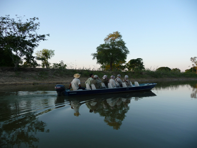 Boat ride on the Pixaim River. Photo by Gina Nichol.